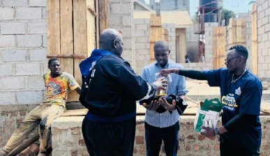 Yaobai field team engaging construction workers at a building site